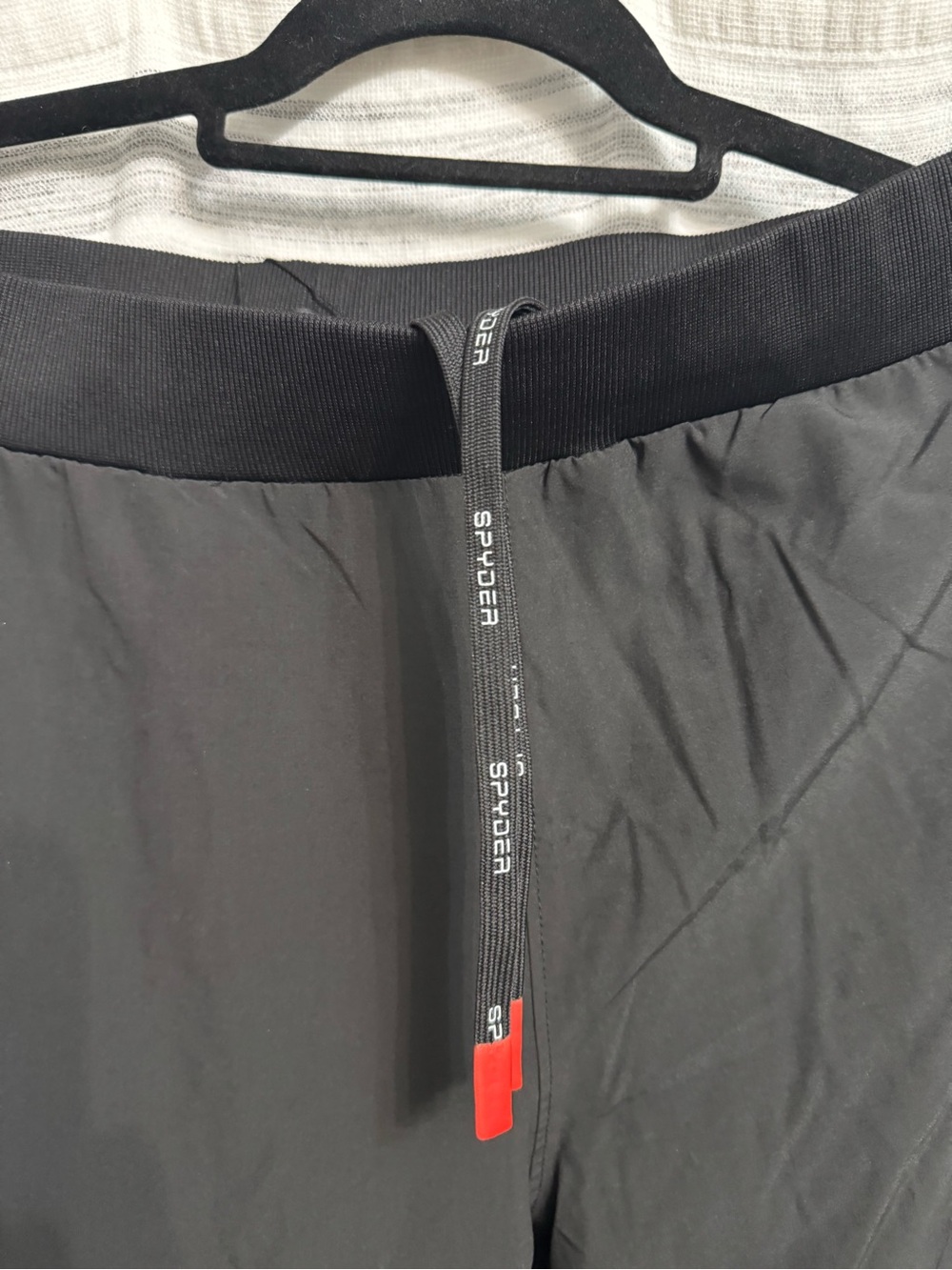 Spyder Active Black and Red Product Tag